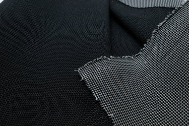 UHMWPE ultra stretch fabric shown in black for sewing bags