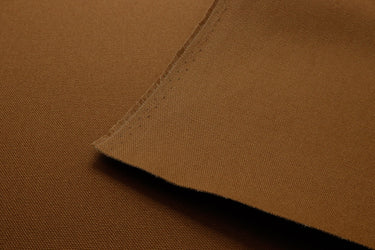 100% cotton canvas shown in a brown commonly used for workwear