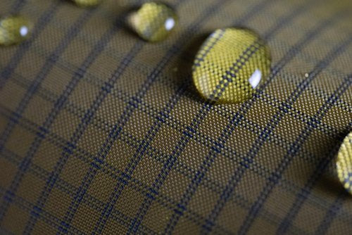 Coyote brown ultragrid fabric with UHMWPE gridstop. Water-resistant fabric