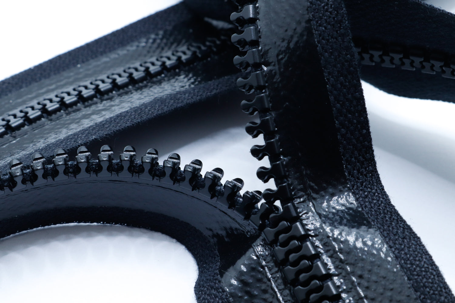 Paskal S-Lock molded tooth zipper close up showing zipper tape and zipper teeth