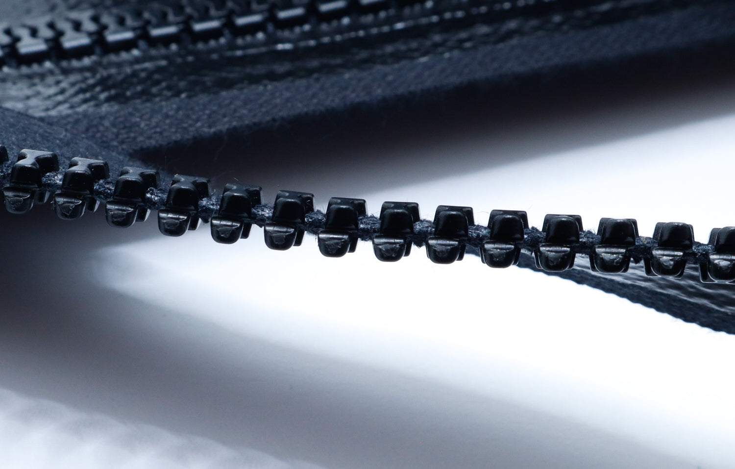 Paskal S-Lock molded tooth zipper close up showing offset teeth