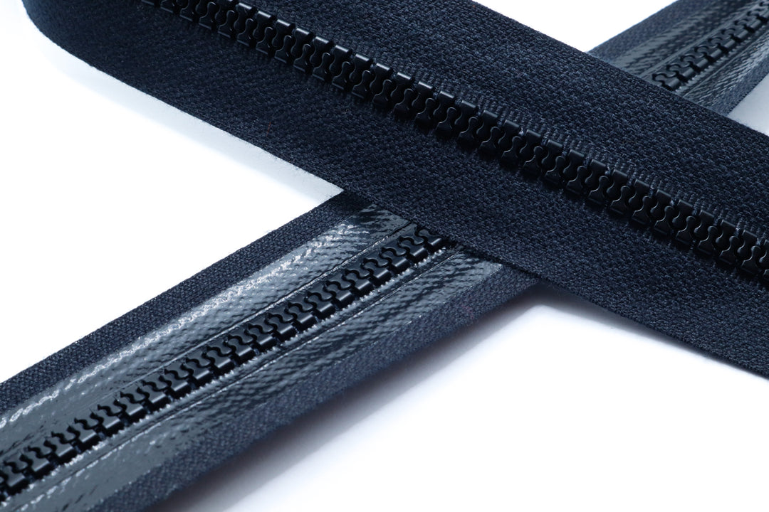 Paskal S-Lock molded tooth zipper close up showing zipper tape