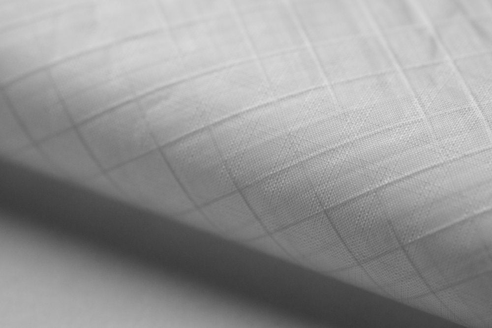 UltraTX50 Sail white laminate fabric for ultralight gear making and sewing projects.