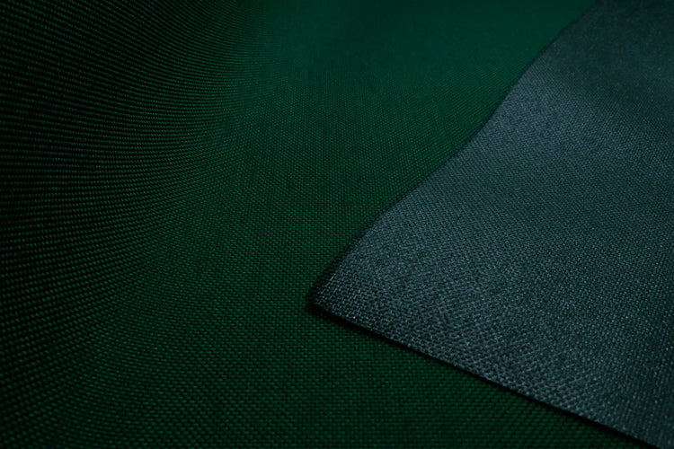Close-up of forest green colored Cordura Classic 1000D nylon 6.6 fabric texture