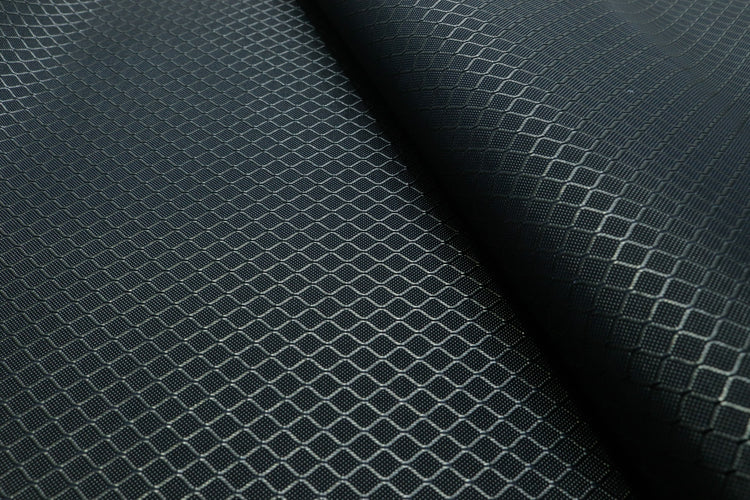 close-up of light grey diamond ripstop nylon fabric