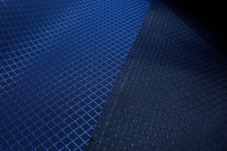 close-up front and back of royal blue diamond ripstop nylon fabric
