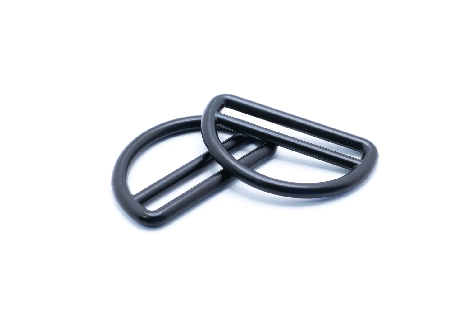Black metal D-ring shown on a white background, commonly used to make backpacks