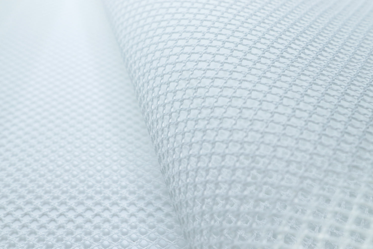 Durable white mesh fabric ideal for gear-making and sewing projects