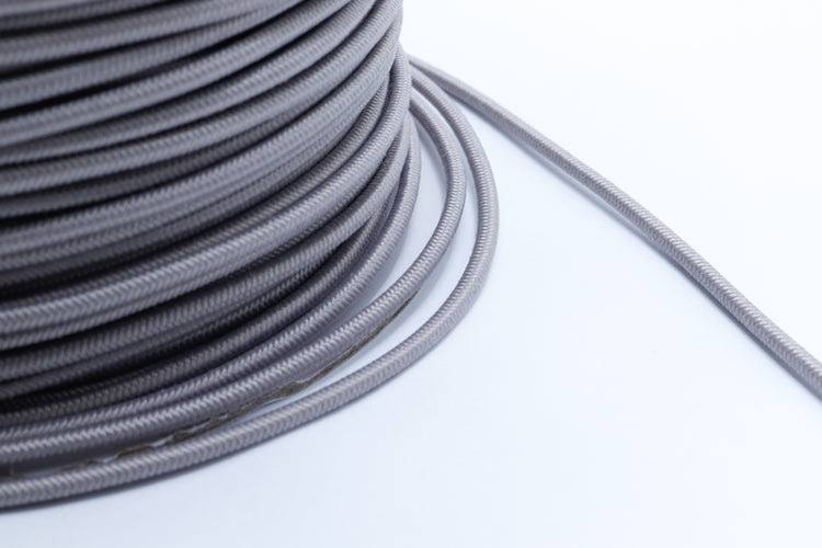 Close-up of 2.5mm elastic shock cord with durable braided jacket