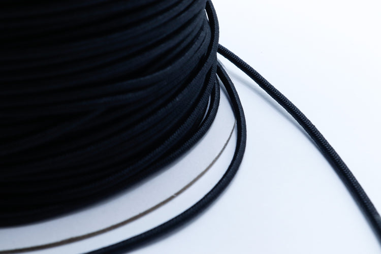 Close-up of 2.5mm elastic shock cord with durable braided jacket