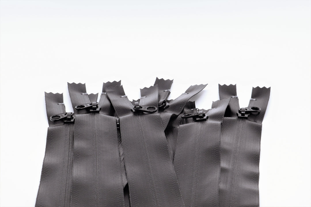 multiple Closed-end YKK AquaGuard Zipper. Water resistant zippers available in bulk and custom specifications.
