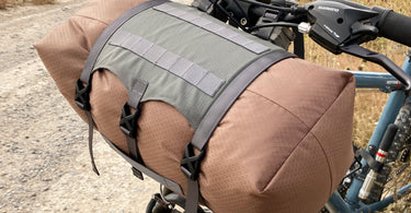 Handlebar bag on front of a bike.