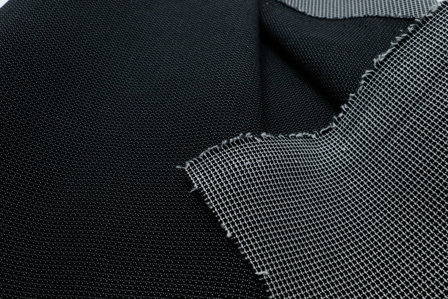 UHMWPE ultra stretch fabric shown in black for sewing bags