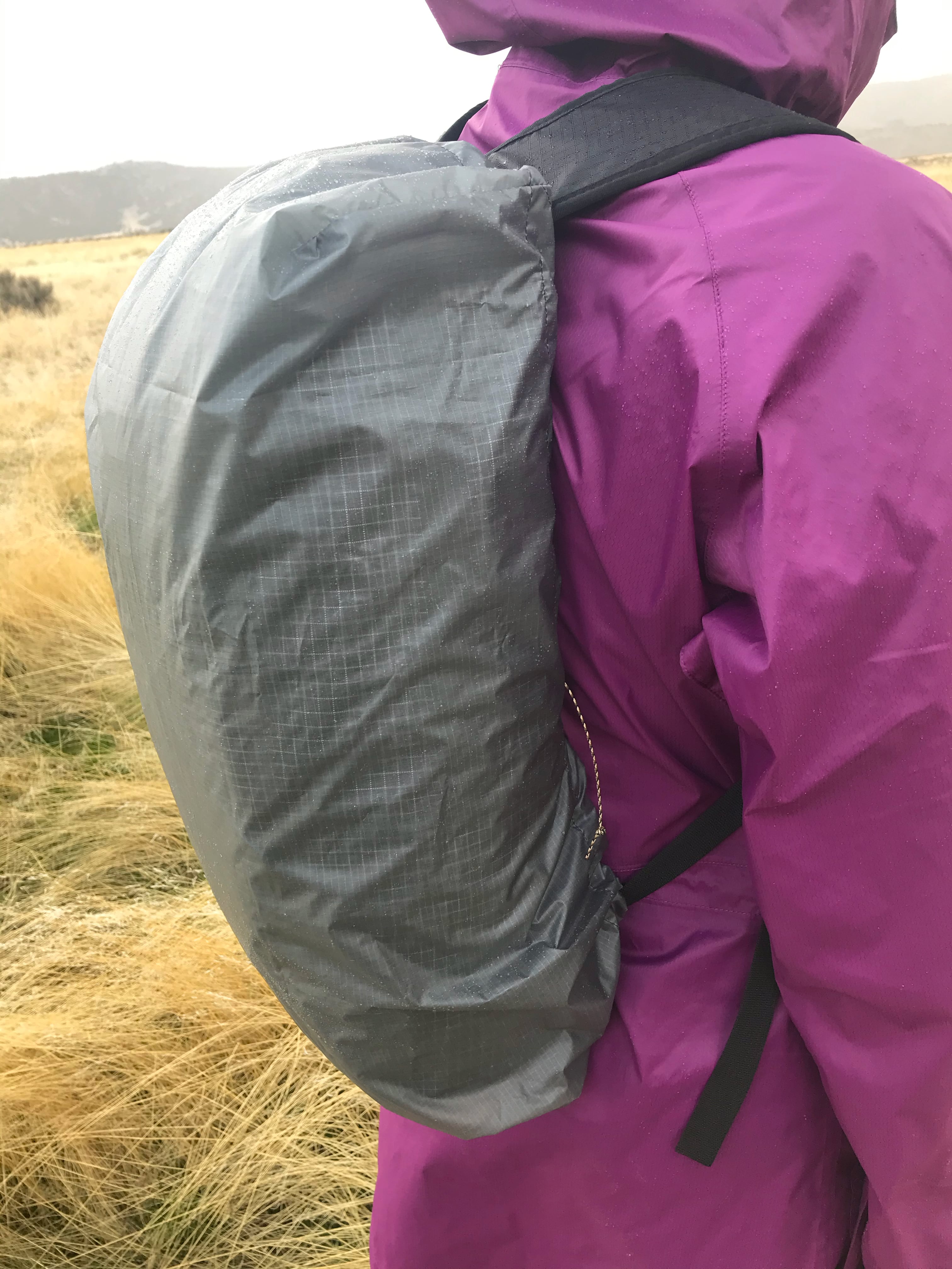 View of a DIY sewing pattern for a rain cover for backpack being used outside