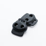 Black plastic double cord locks on a white background