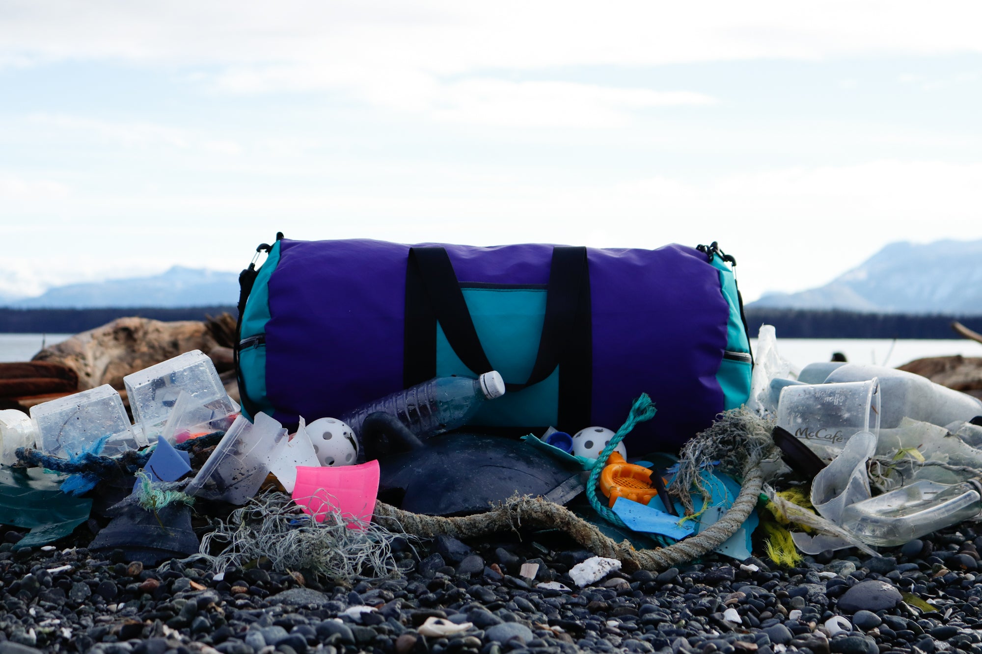 This is a duffle bag made from recycled fabric offered by refasten Canada, as well as YKK AquaGuard zipper and Woojin Plastic hardware.  It featured plastic buckles, ladder locks, webbing, and adjusters