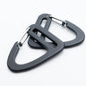 Two gray carabiner clips on a white background made out of aluminum