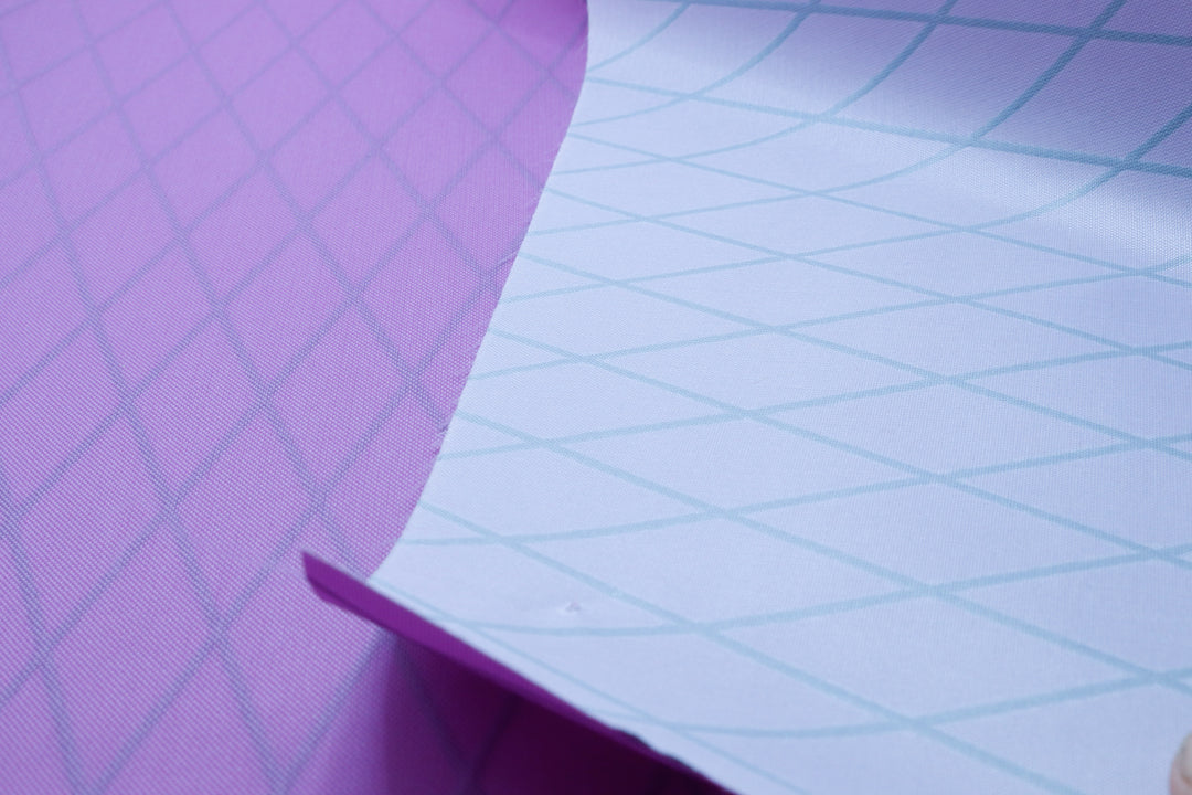 X-PAC VX21 nylon pack fabric in mulberry. Close up showing the x-ply ripstop pattern of the fabric 