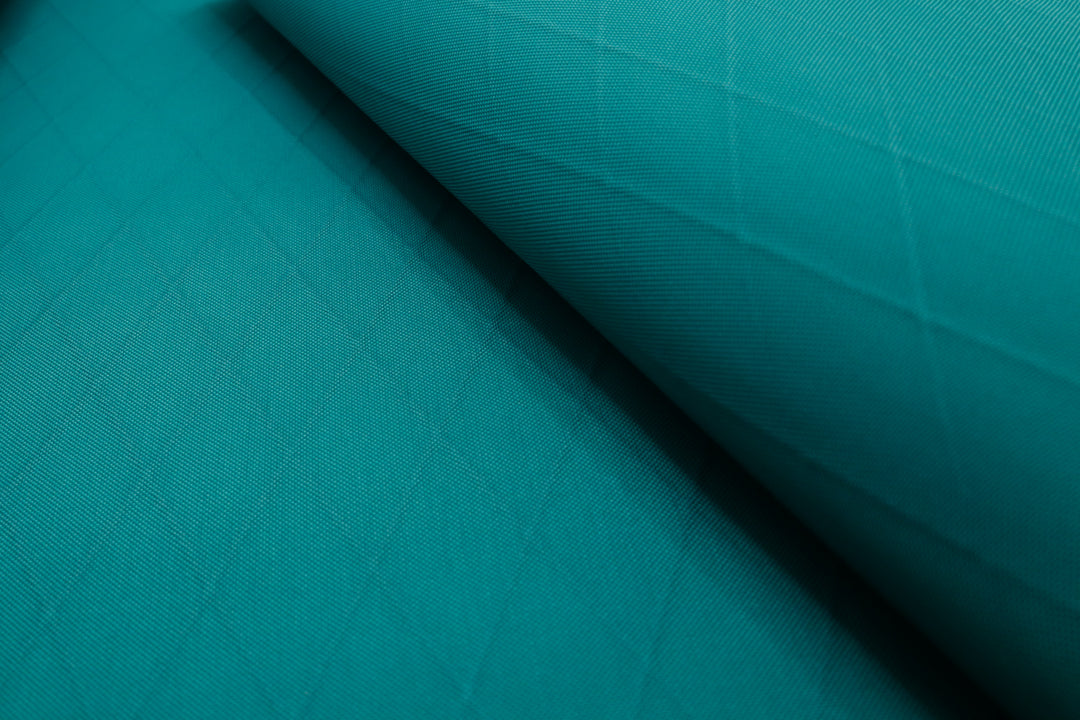 X-PAC VX21 nylon pack fabric close up showing the x-ply ripstop grid and texture of fabric