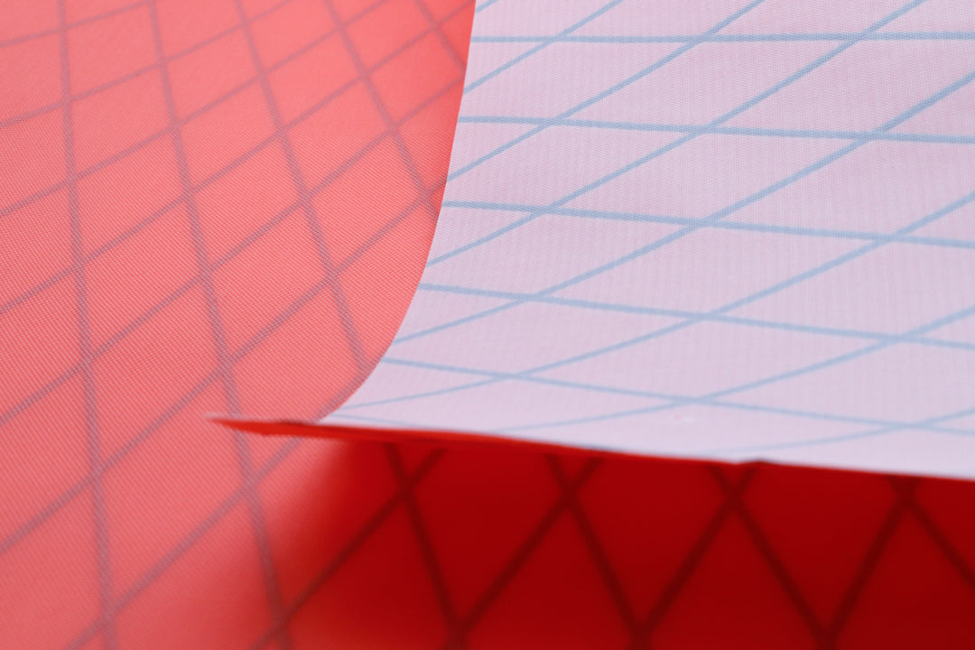 X-PAC VX21 nylonpack fabric in coral close up showing the x-ply ripstop pattern in the fabric
