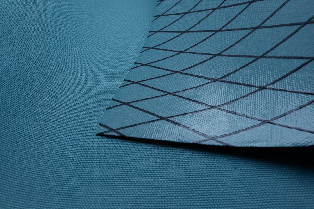 Close up of X-PAC X11 cotton duck pack fabric showing the texture and ripstop x-ply pattern of the fabric weave