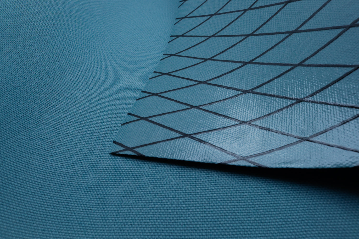 Close up of X-PAC X11 cotton duck pack fabric showing the texture and ripstop x-ply pattern of the fabric weave
