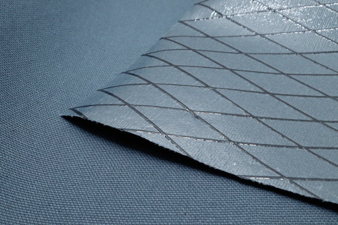 Close up of X-PAC X11 cotton duck fabric in storm grey showing the x-ply weave in the ripstop fabric