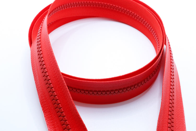 YKK vislon aquaguard zipper chain sold per foot in orange.