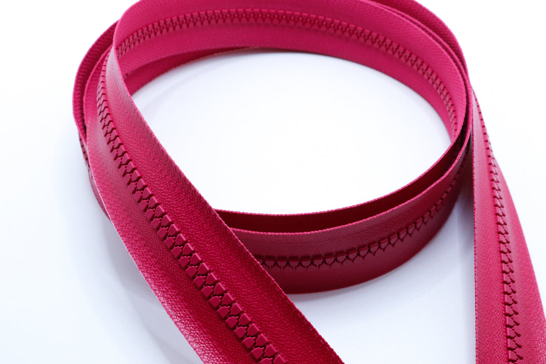 YKK vislon aquaguard zipper chain sold per foot in pink.