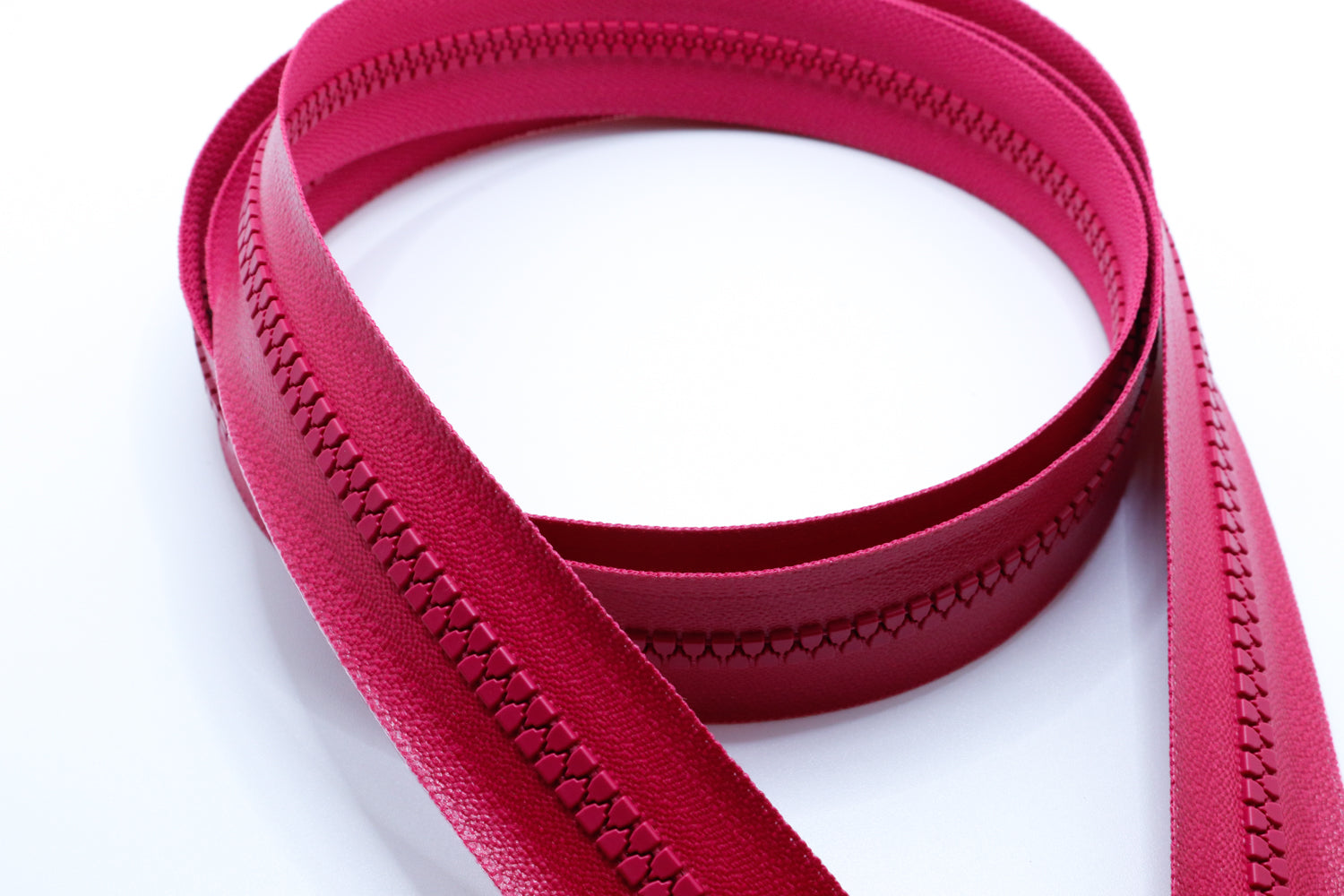 YKK vislon aquaguard zipper chain sold per foot in pink.
