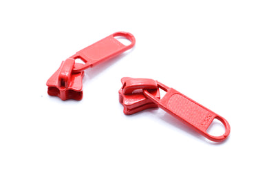 YKK vislon slider in bright orange for use on YKK vislon zipper chain