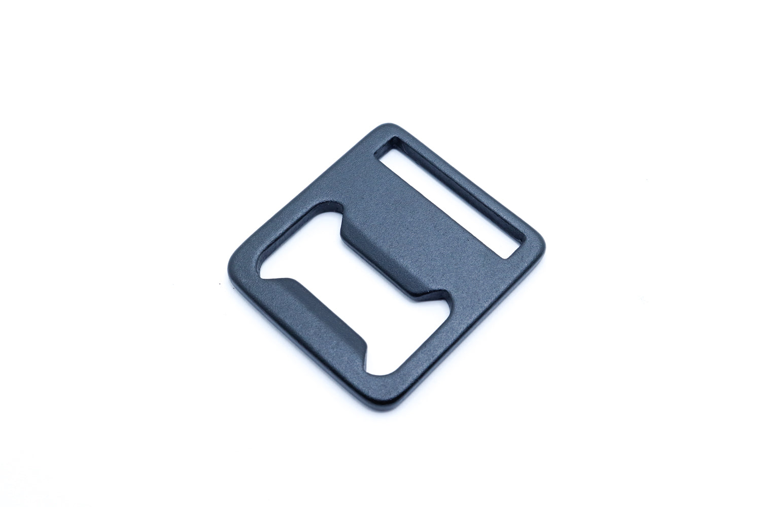 Close-up of anodized aluminum bottle opener for sewn gear projects