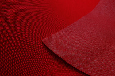 Close-up of red colored Cordura Classic 1000D nylon 6.6 fabric texture