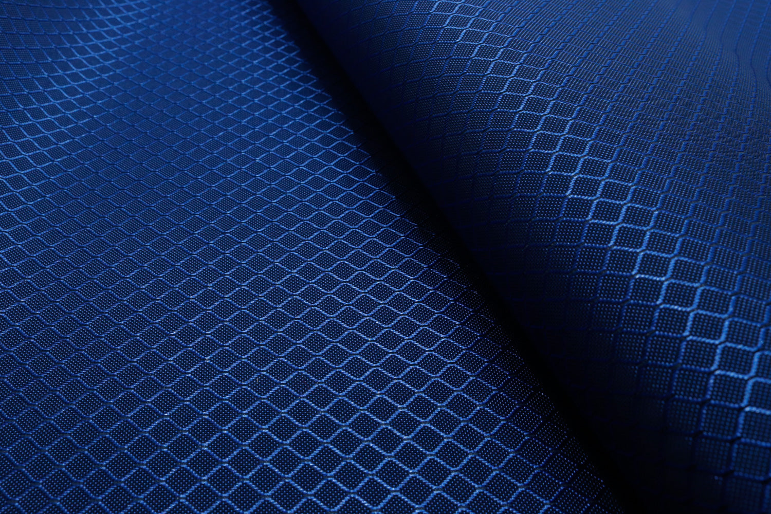 close-up of royal blue diamond ripstop nylon fabric