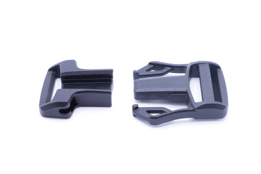 Black magnetic side release buckle shown open with the two halves apart