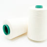 two 6000 yard spools of thread used for sewing.