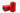 Two red spools of thread with green ends on a white background