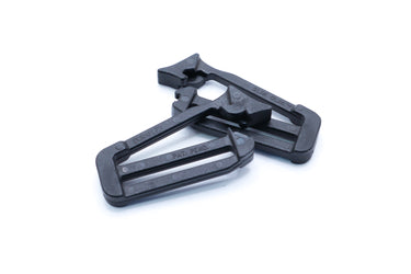 Black plastic slik clip shown on a white background, commonly used to temporarily attach webbing.