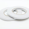 two rolls of seamstick tape to hold seams together while sewing