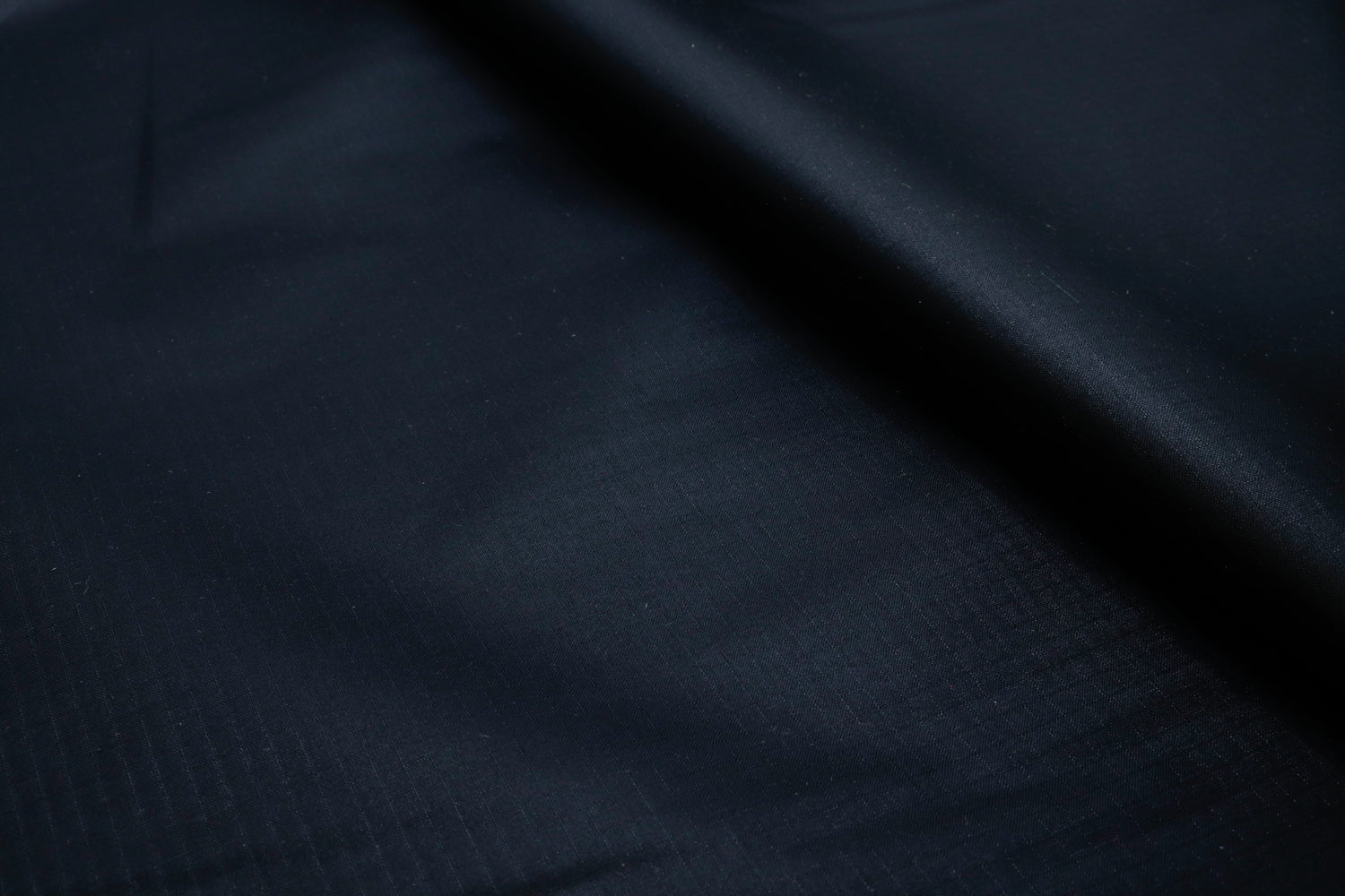 Close-up of Black Silicone coated silnylon for making tarps and other MYOG projects