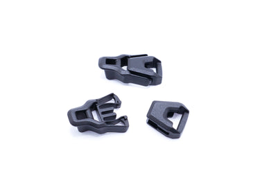 Black acetal buckle joining cord on one side to 10mm webbing on the other