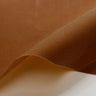 close up of a tan waxed canvas showing the texture