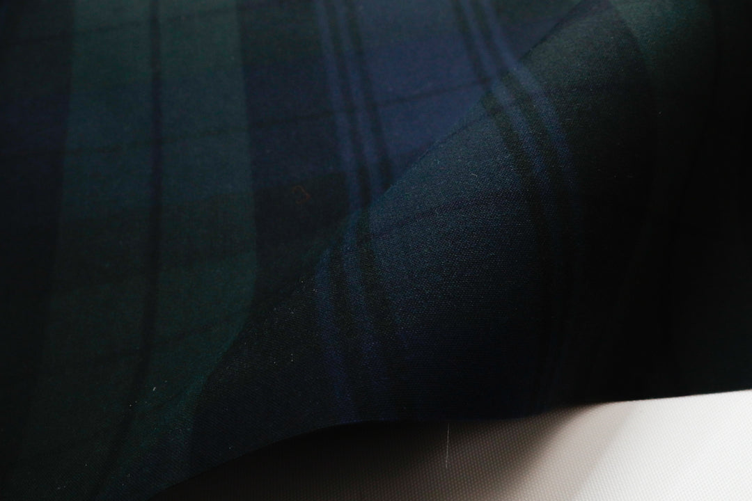 close up of 6.75 oz waxed canvas in a plaid pattern for bags and other sewing projects