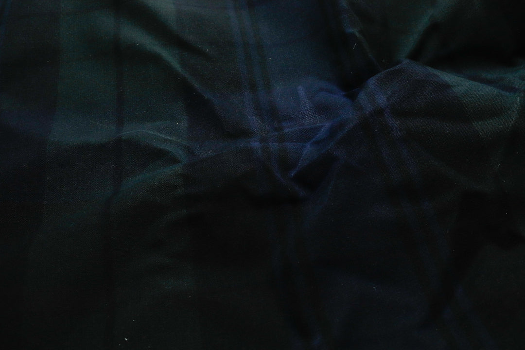 close up of 6.75 oz waxed canvas in a plaid pattern for bags and other sewing projects