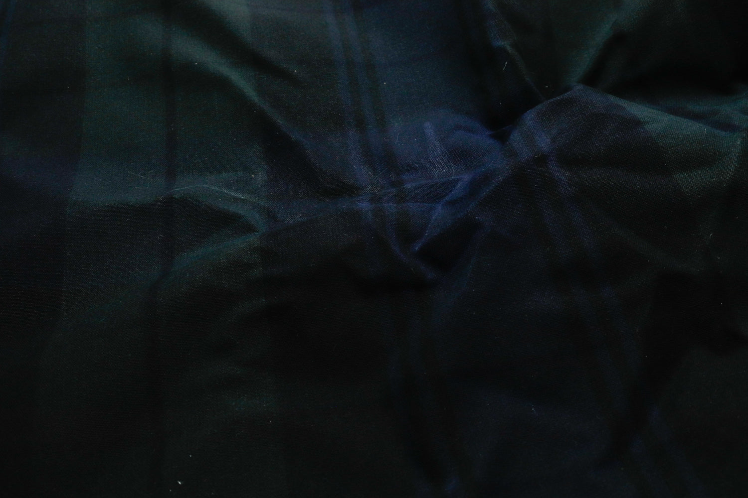 close up of 6.75 oz waxed canvas in a plaid pattern for bags and other sewing projects