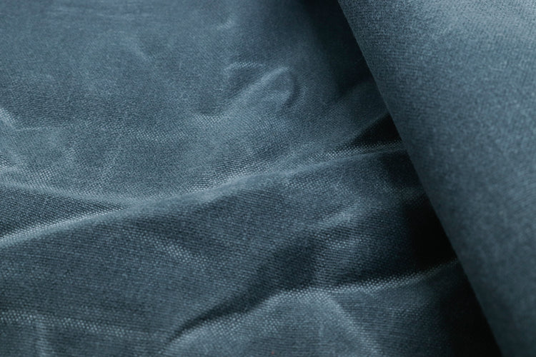 water-resistant waxed canvas fabric used for sewing backpacks, bags, and making outdoor gear.