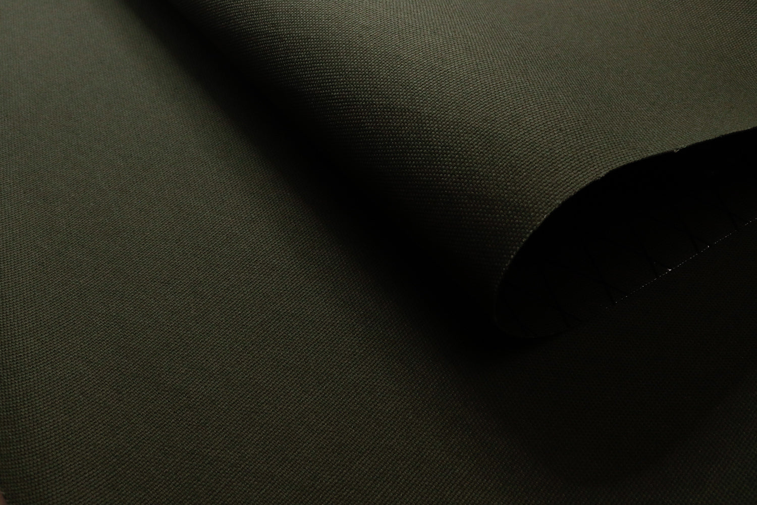Olive X11 xpac fabric closeup showing the texture of the canvas