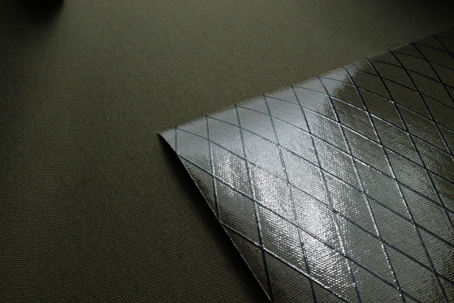 Close up of olive x11 xpac canvas showing the front and backside
