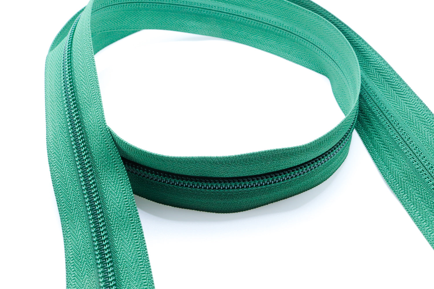 Mountain green YKK #5 coil zipper chain on a white background