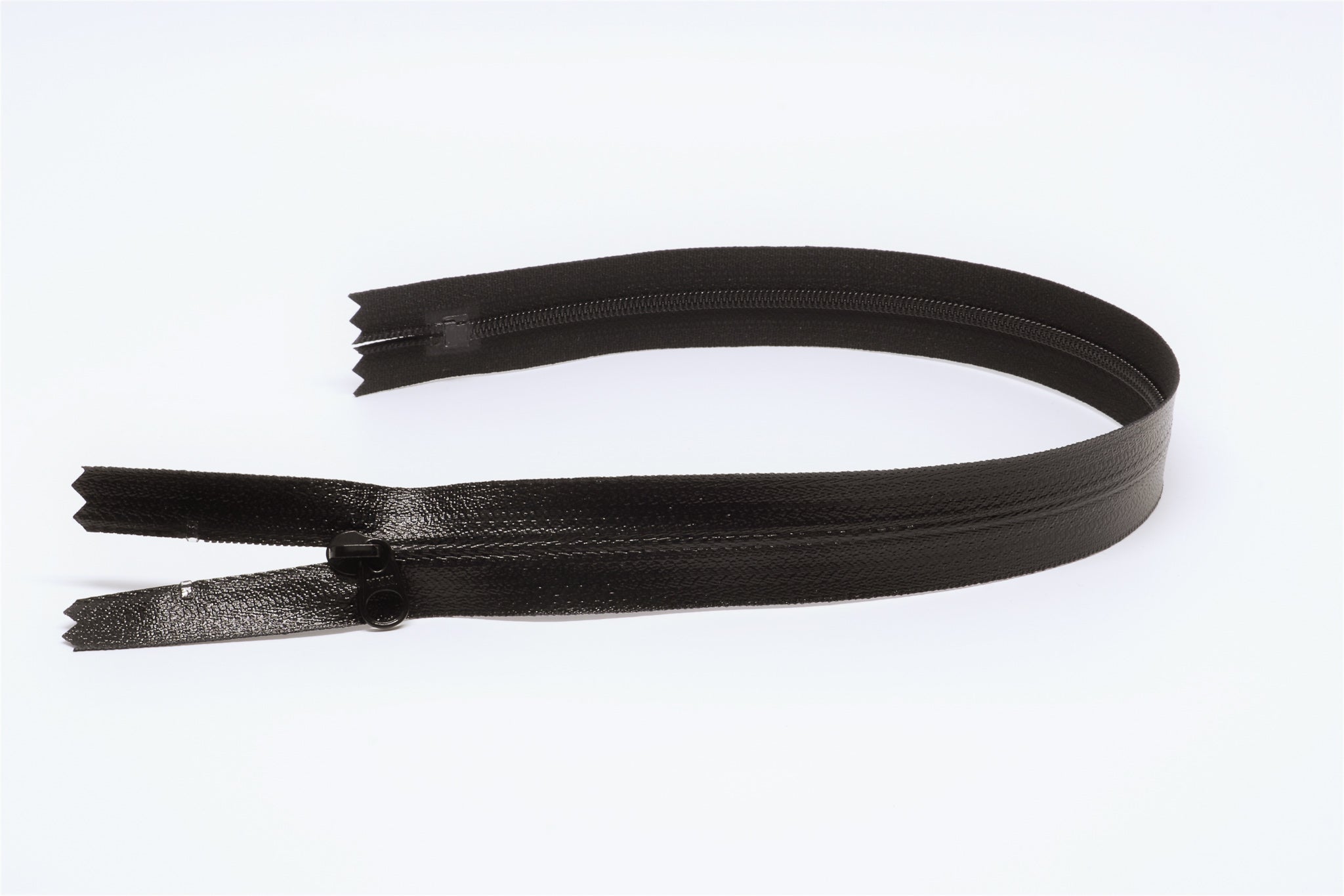 Black Closed-end YKK AquaGuard Zipper. Custom requests and bulk quantities available.